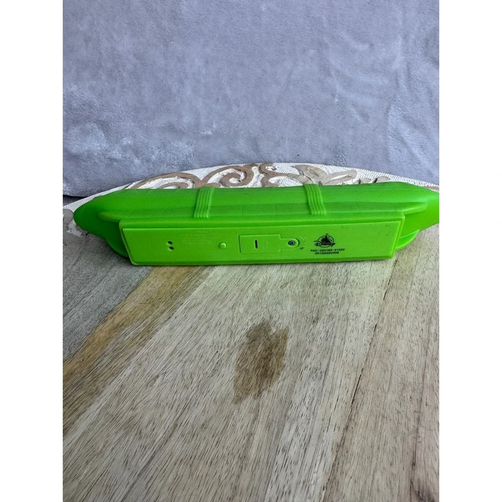 Disney Parks Monorail Green Rubber Squeeze Toy Light‎ Up FAC-024163-21330 Neon